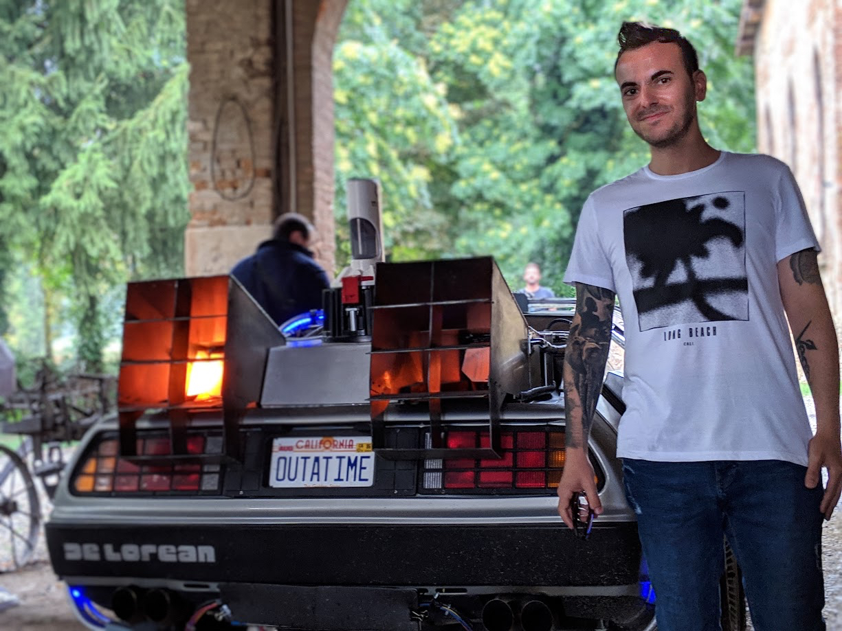 Andrea Menin with the famous DeLorean: “*Back to the Future *sparked a love of technology and music in me“